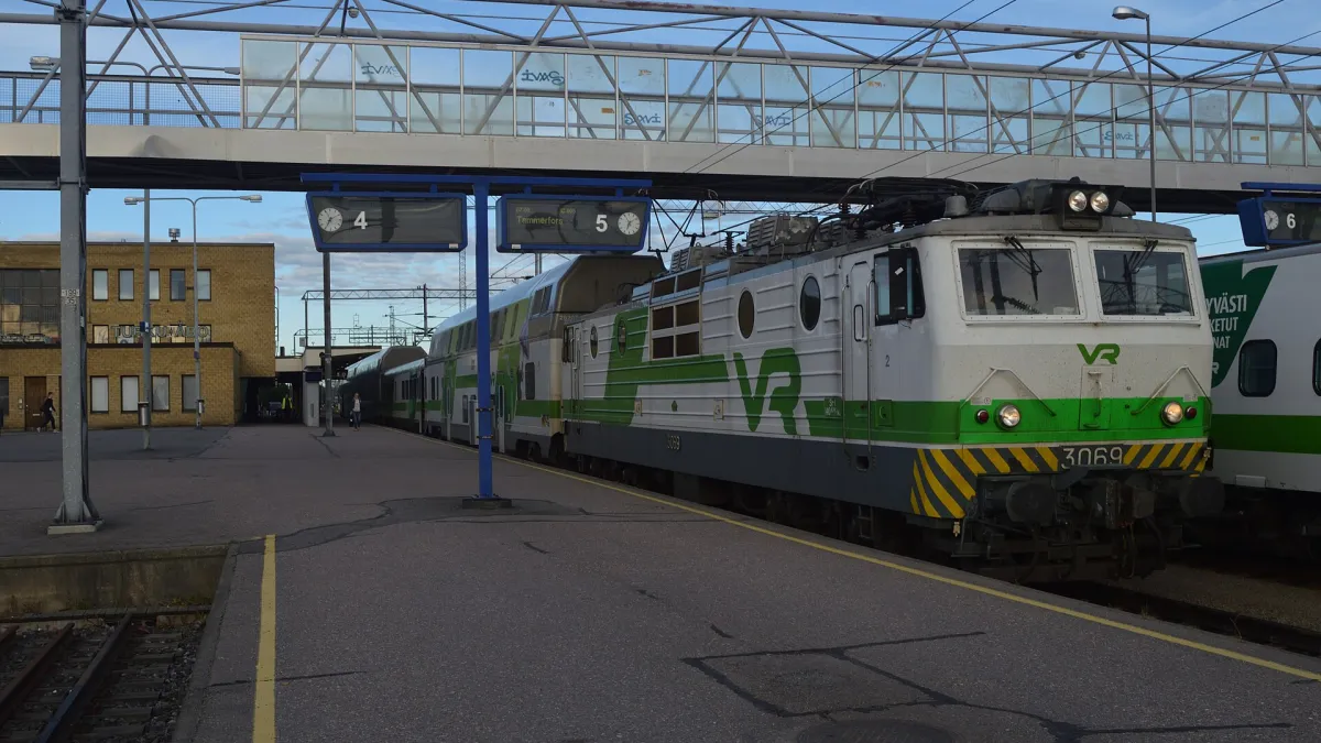 Built between 1973 and 1985 in the former USSR by Novocherkassk Electric Locomotive Plant, the Sr1s are still in use in 2016 on both freight and passenger traffic. Passenger traffic inckludes many of the InterCity services on the cross-country route from Turku to Tampere. With long hours of daylight in July, photographic conditions were generally good. Taken during the morning of 5 July 2016, Sr1 3069 is coupled to a mixed rake of single and double deck stock on IC905, 07:00 Turku to Tampere.
