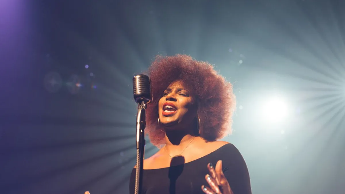 woman performing on stage