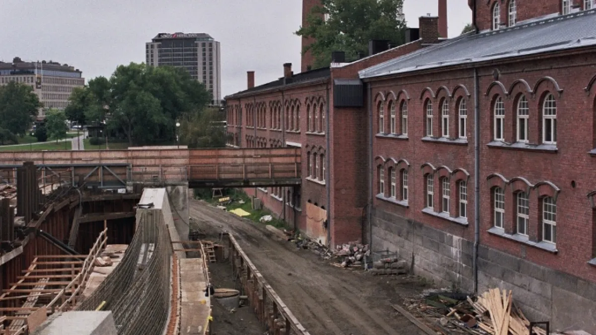 The former Frenckell paper mill and a related construction site alongside the Tammerkoski rapids in central Tampere, Finland.