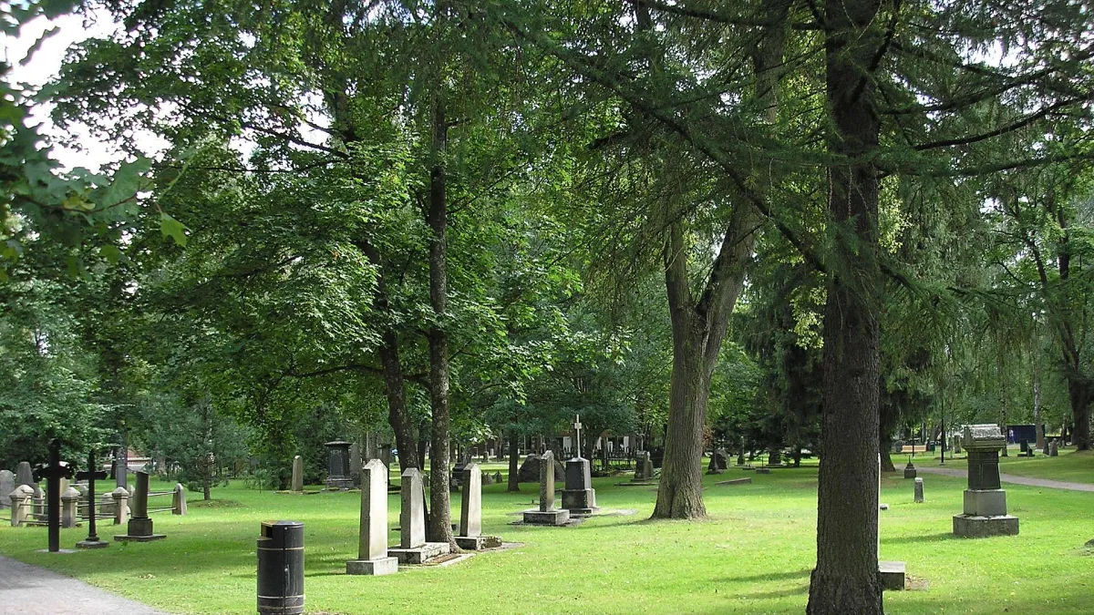 A view of Pyynikin kirkkopuisto (Pyynikki Church Park) in Tampere, Finland. The park is founded on the place of the first cemetery of Tampere, and there are still some old tombstones scattered in the park area.