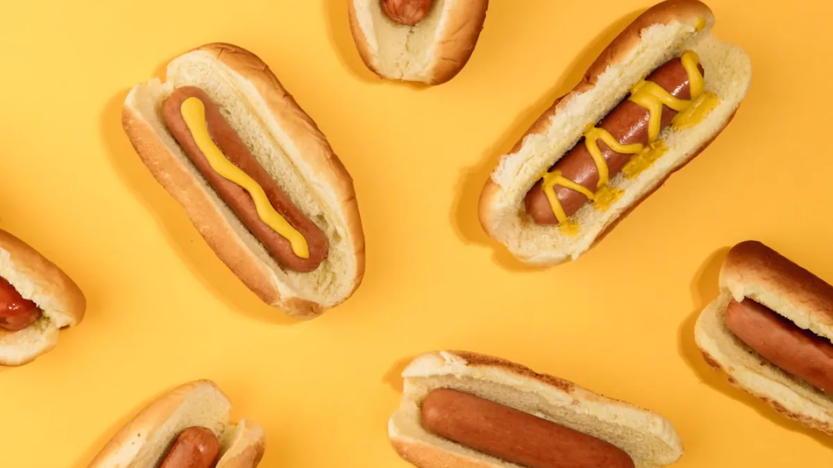 brown bread with hotdog on top