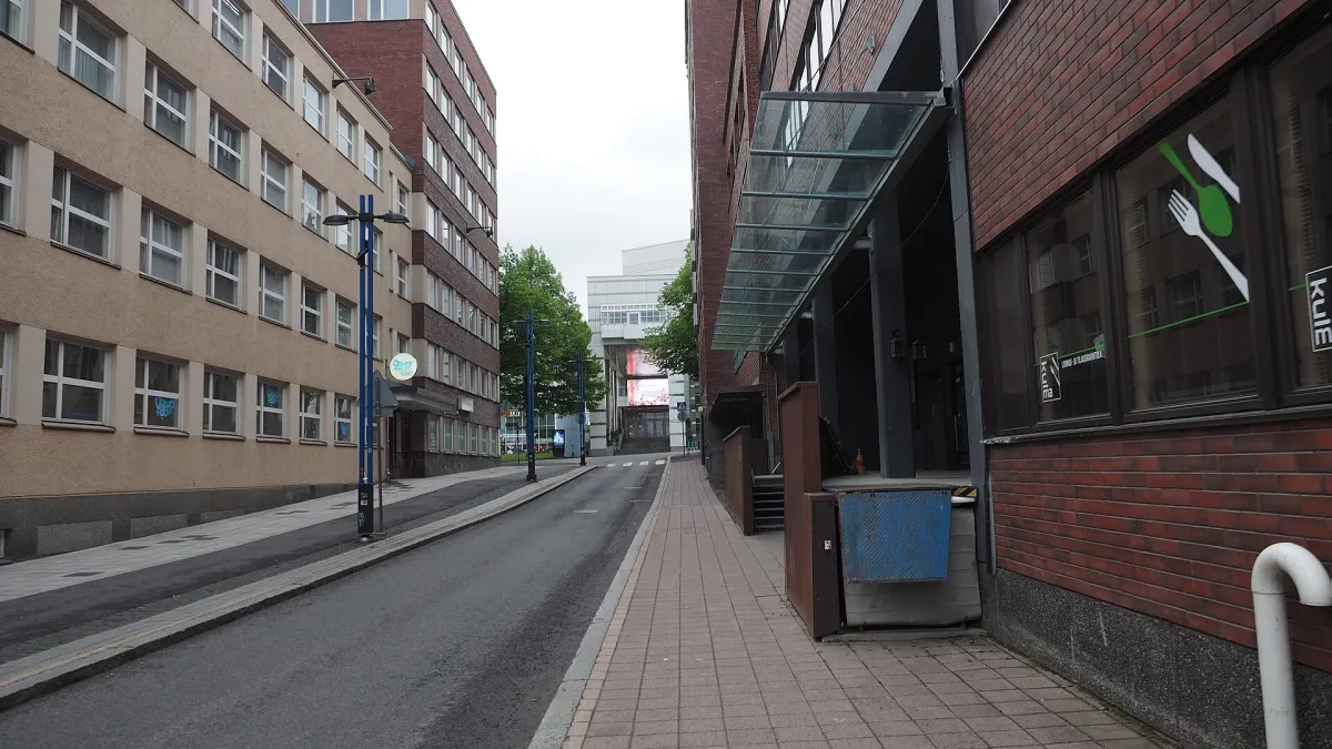 A view of the street Åkerlundinkatu in Tulli, Tampere, Finland viewed towards the Tampere Hall.